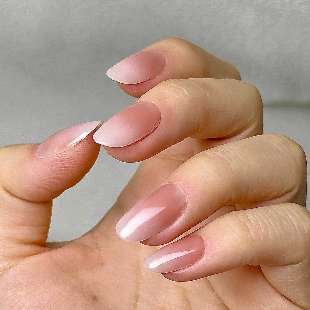 Nue press-on nails worn on hand