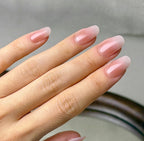 Nue press-on nails worn on hand