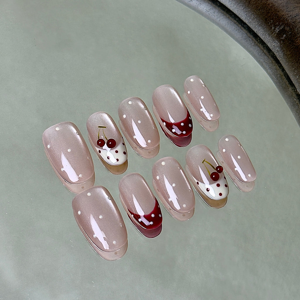 Griotte press-on nail set displayed flat