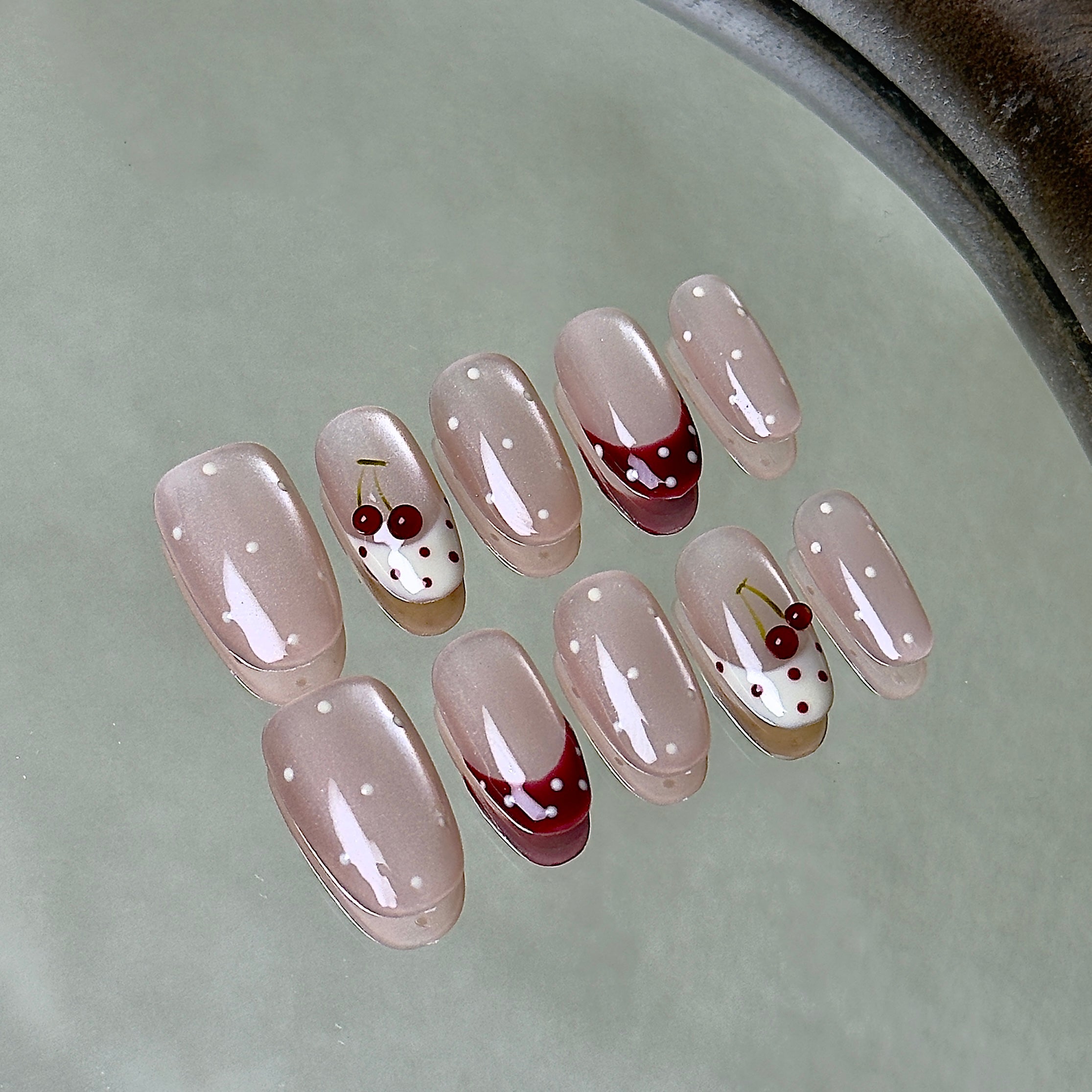 Griotte press-on nail set displayed flat