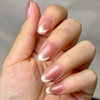 Doré press-on nails worn on hand