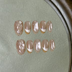 Coco press-on nail set displayed flat