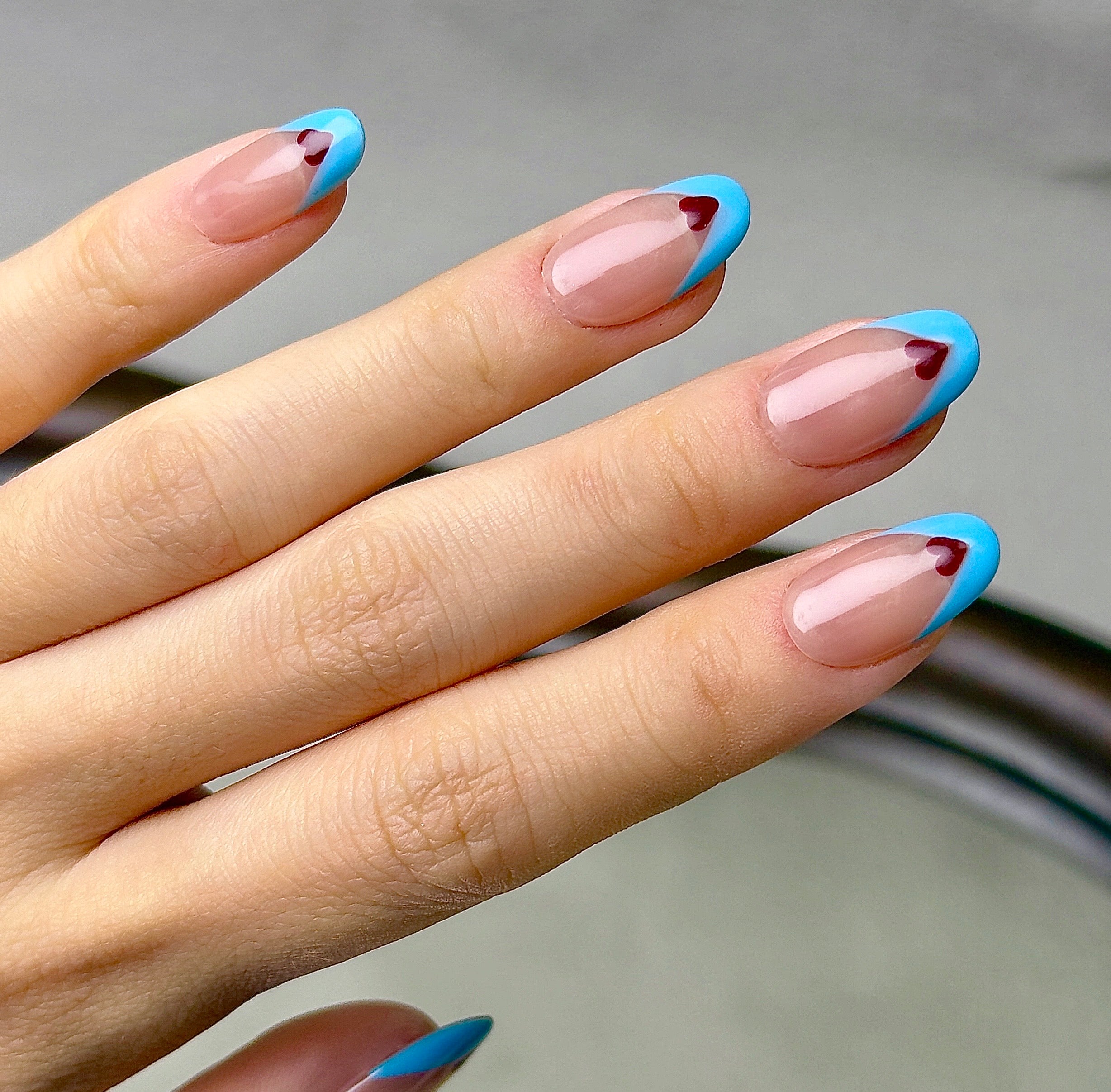 Coeur press-on nails worn on hand