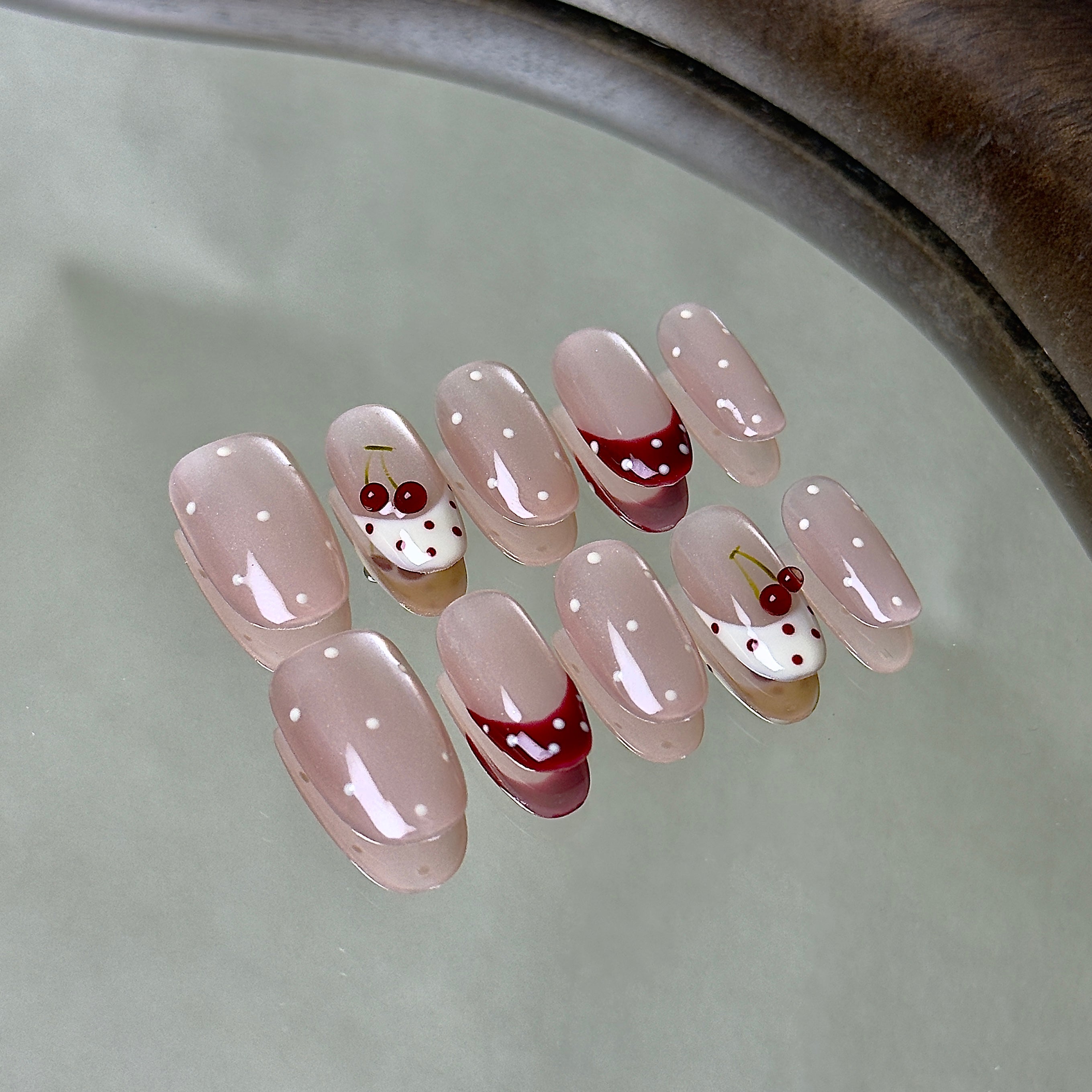 Griotte press-on nail set displayed flat