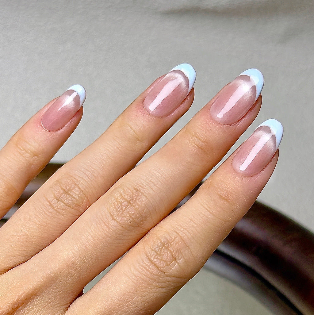 Demi-Lune press-on nails worn on hand