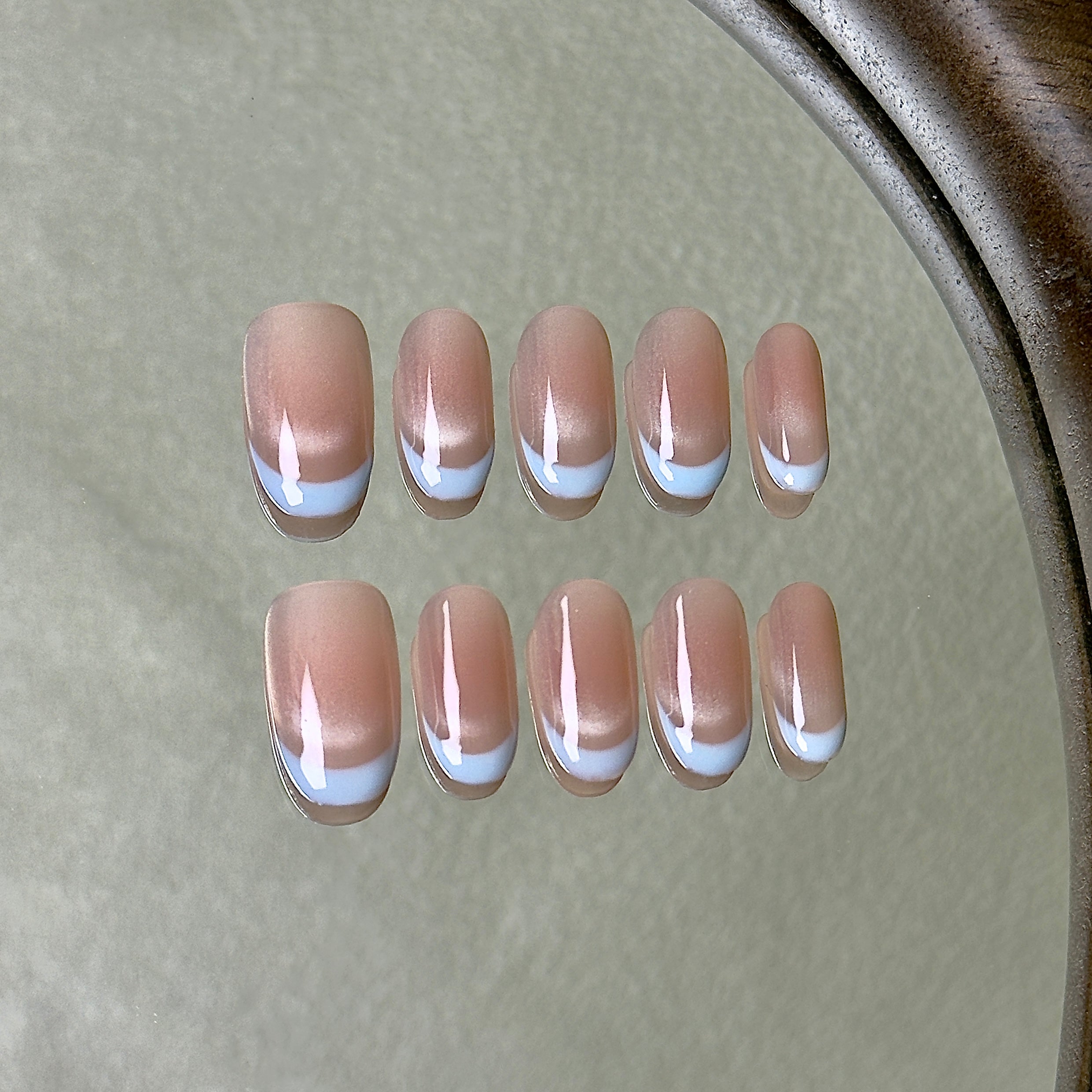Demi-Lune press-on nail set displayed flat