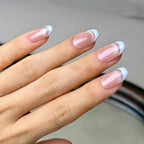 Demi-Lune press-on nails worn on hand