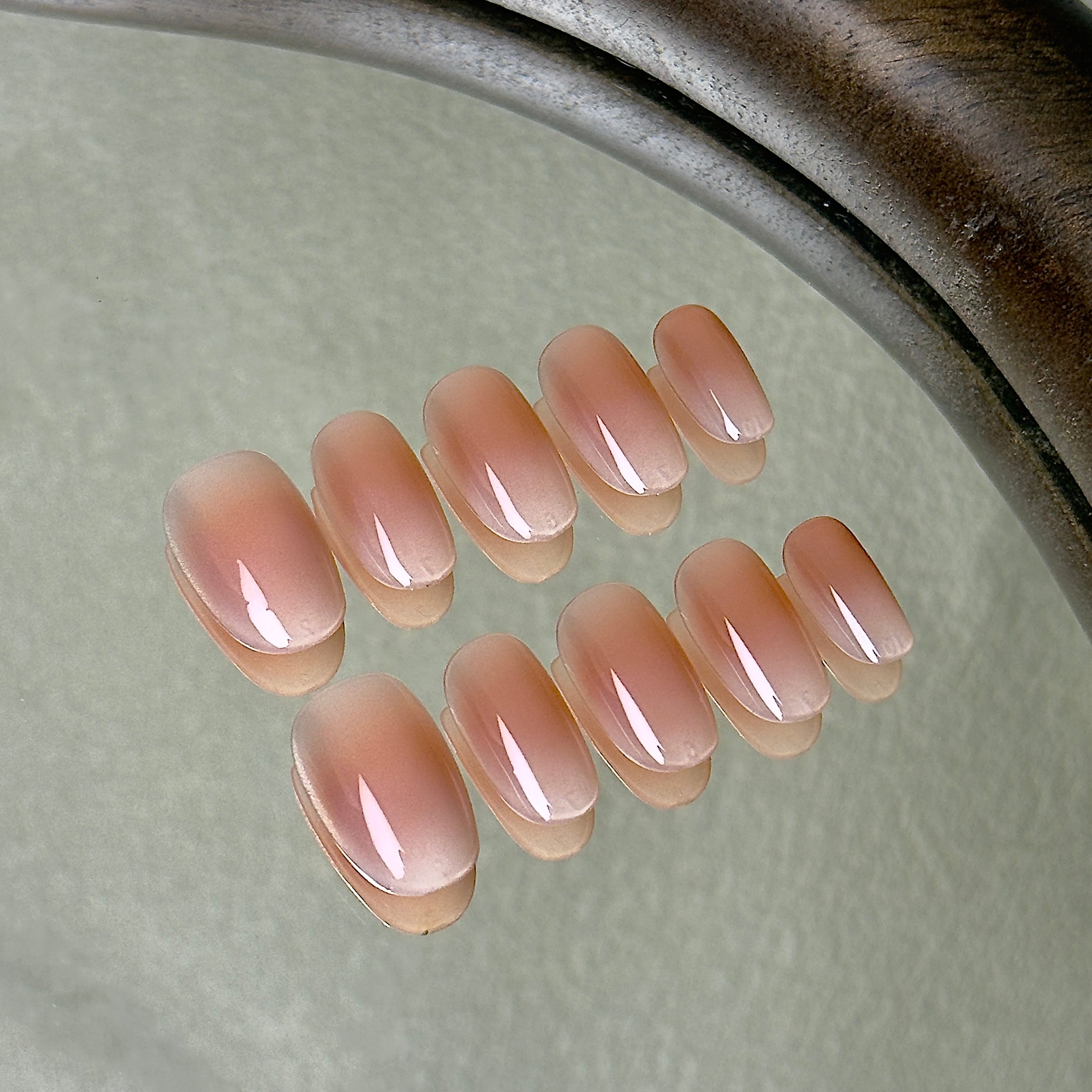 Nue press-on nail set displayed flat