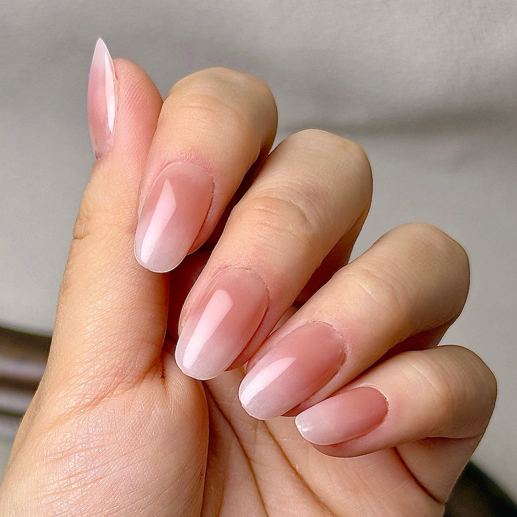 Nue press-on nails worn on hand
