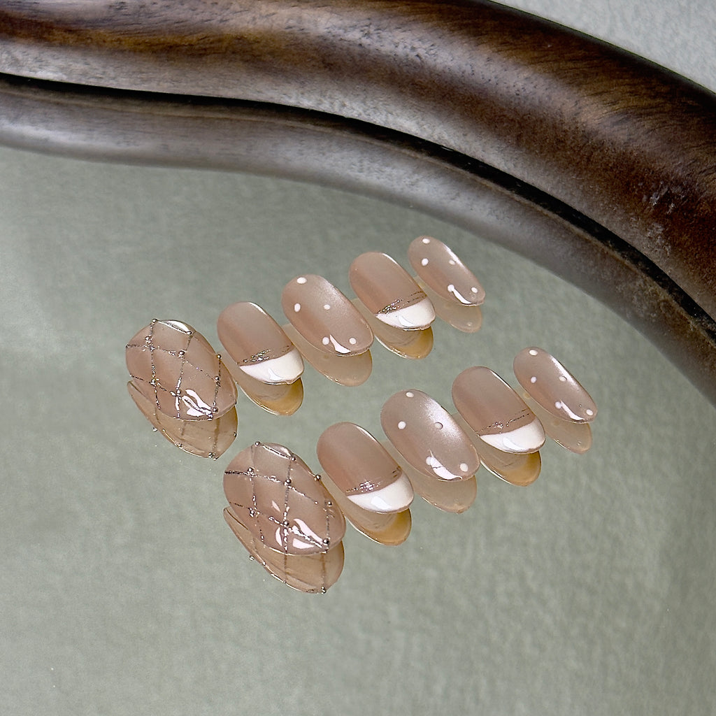 Coco press-on nail set displayed flat