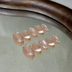 Coco press-on nail set displayed flat