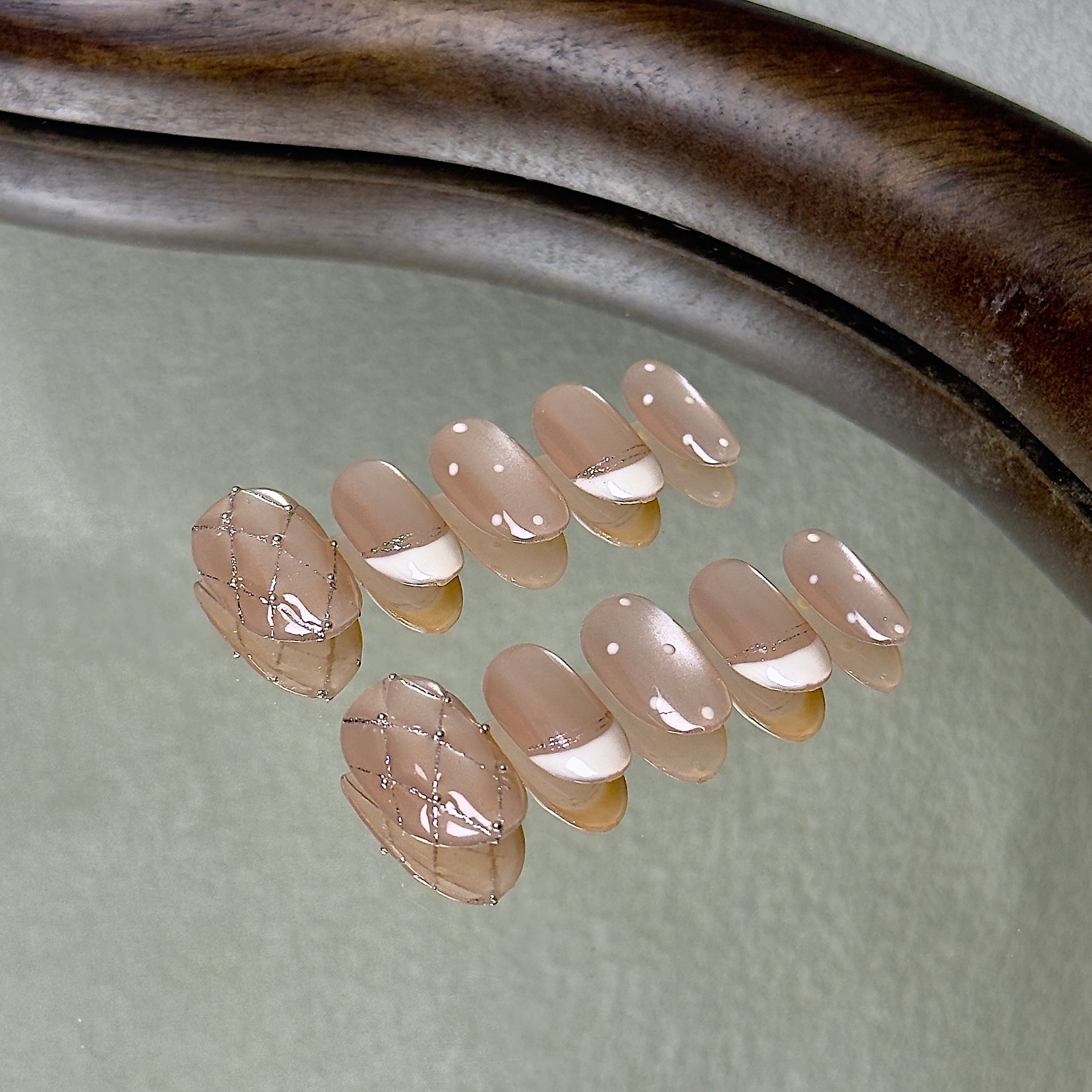 Coco press-on nail set displayed flat