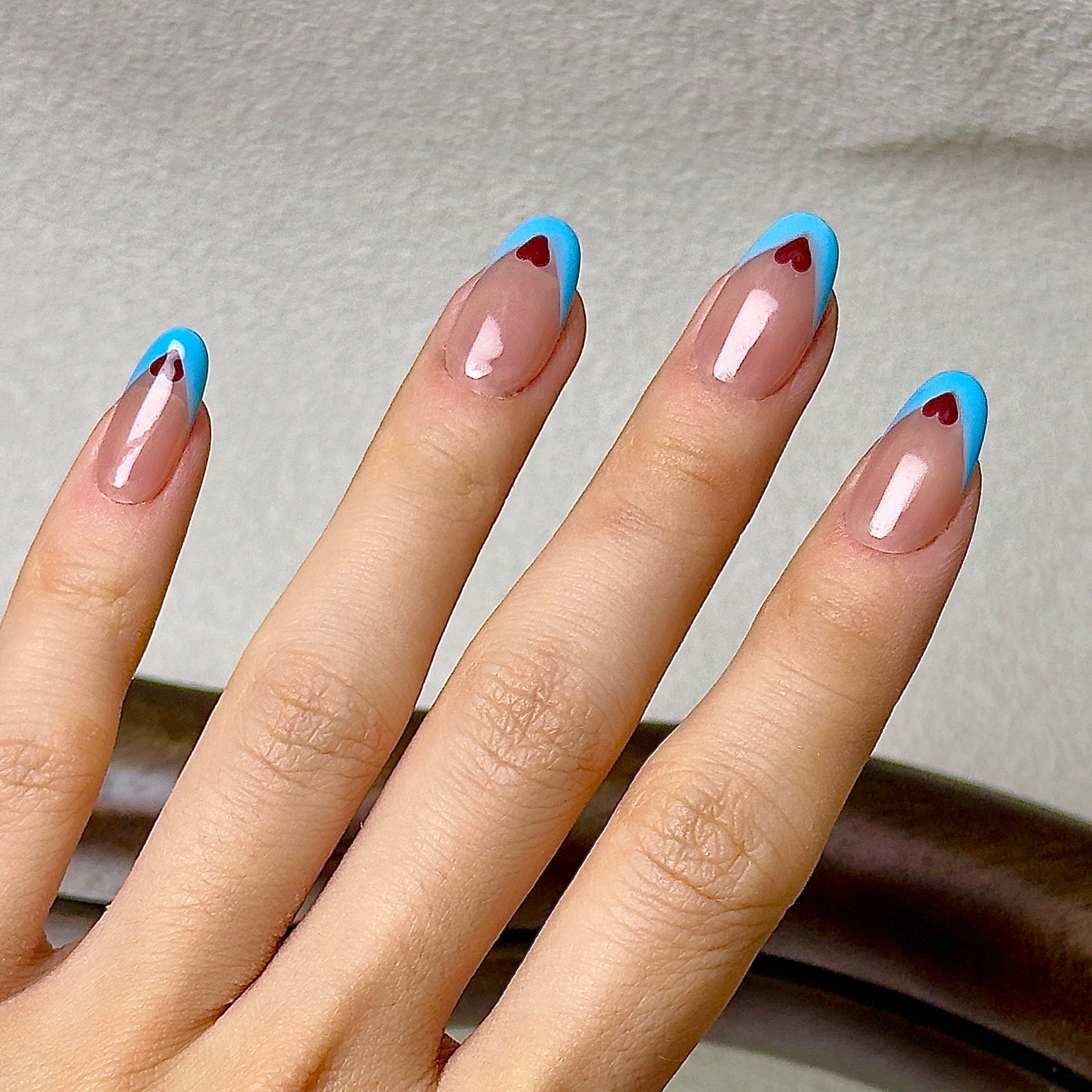 Coeur press-on nails worn on hand