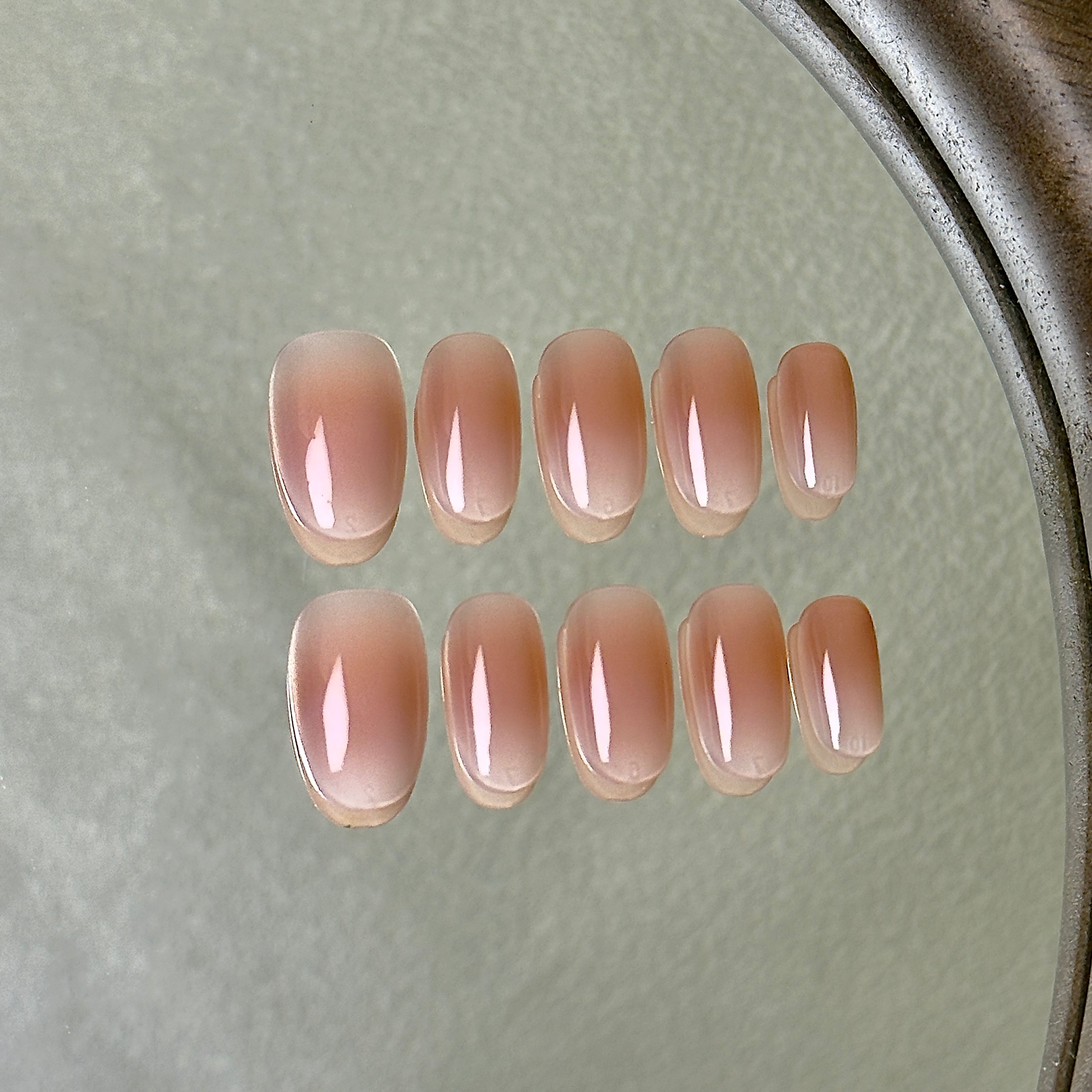 Nue press-on nail set displayed flat