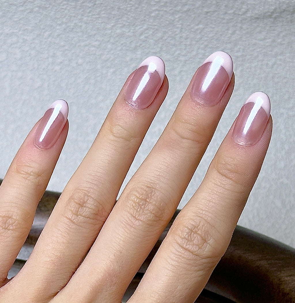 Ballet press-on nails worn on hand