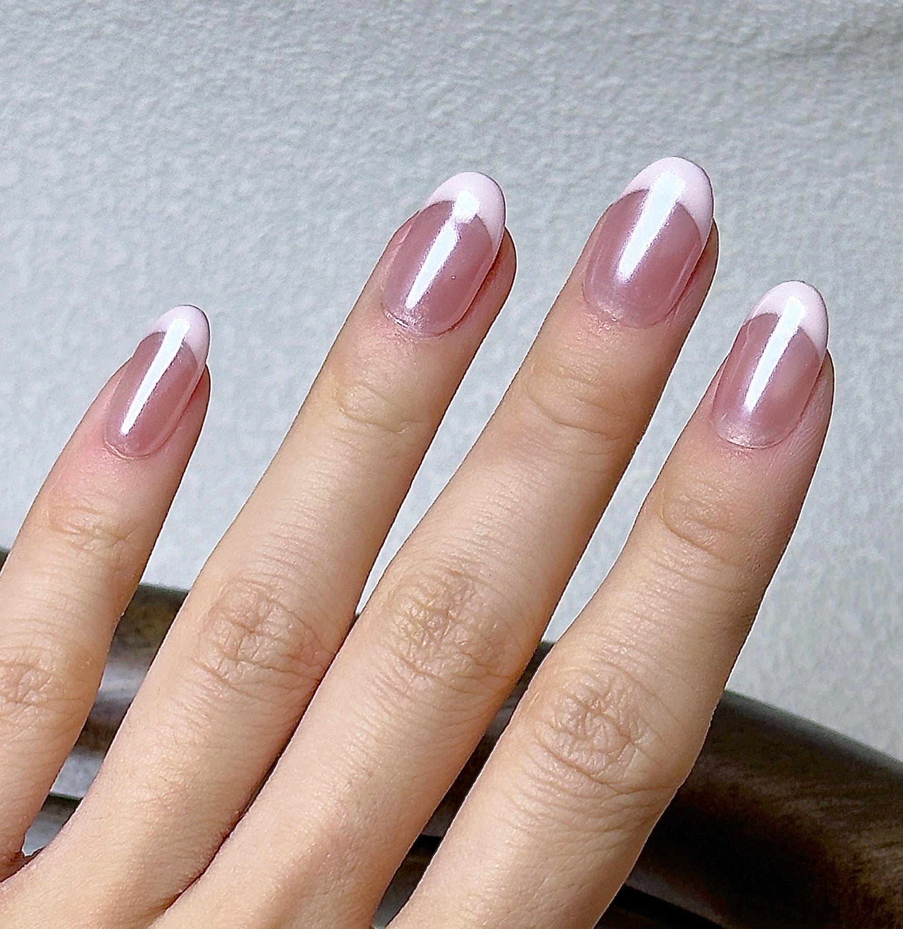Ballet press-on nails worn on hand