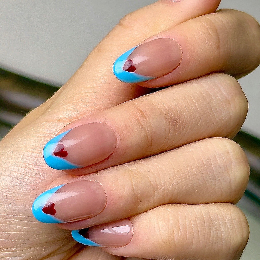Coeur press-on nails worn on hand